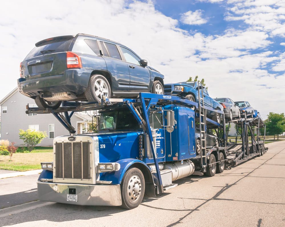 A open carrier with full of cars loaded