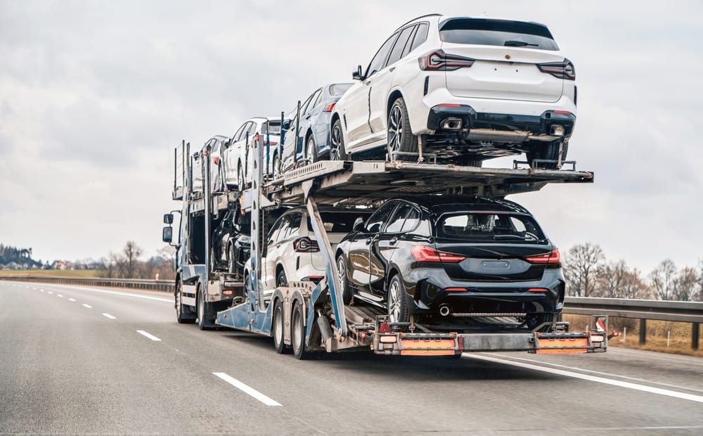 car shipping on an flatbed trailer truck