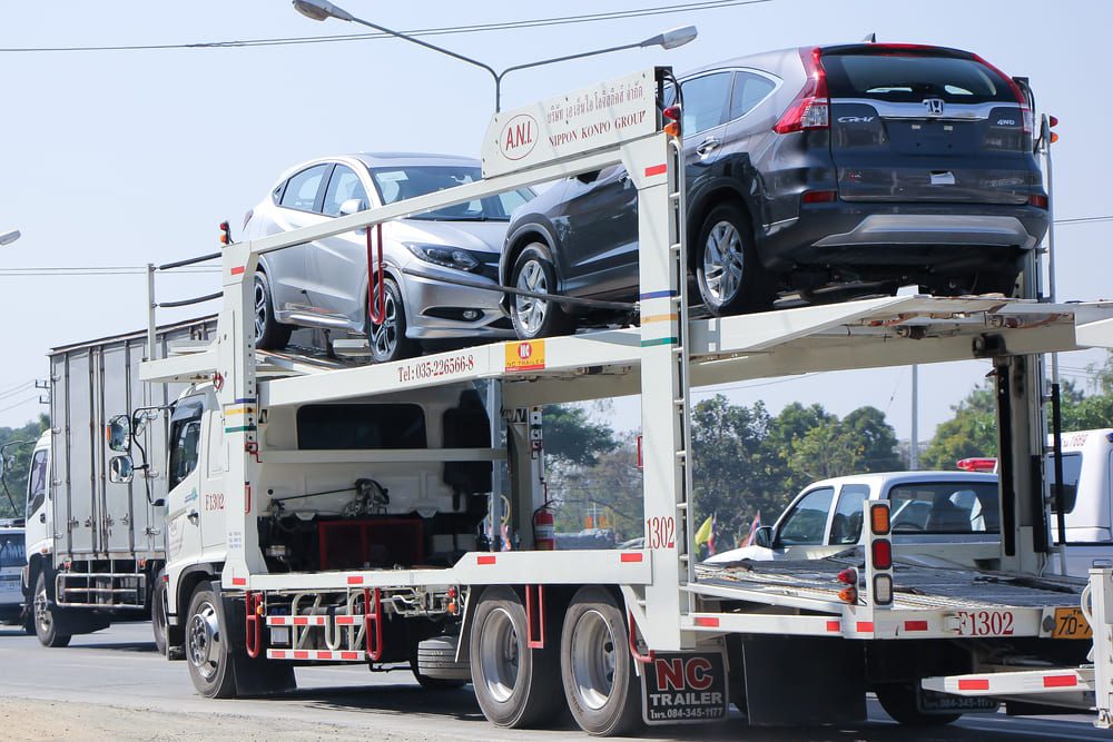 A trailer loaded with cars